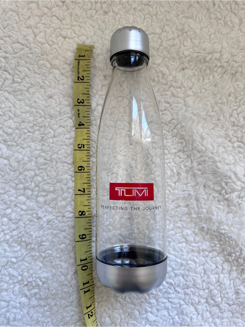 Tumi Clear Water Bottle with Silver Accents and Red Logo - Picture 2 of 6